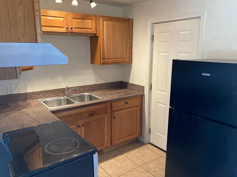 galley kitchen door to back private secure back porch