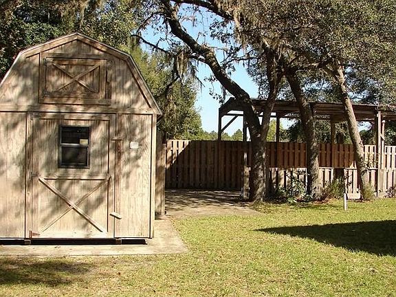 Shed comes with tools & lawn mower and RV/Boat parking.