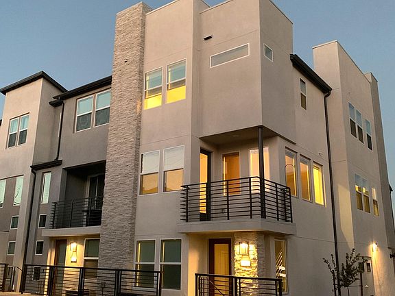 New, modern construction. 3-story corner unit.