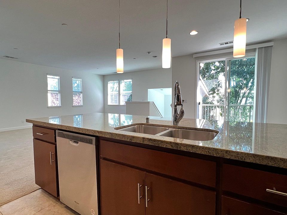 open floor plan. view from kitchen to living and dining areas