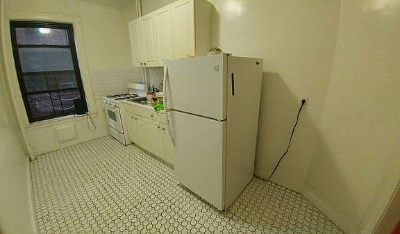4th image of 674 47th St APT 1C