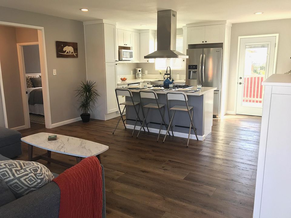 Kitchen- brand new stainless steel appliances, furnished with all cookware and serveware.
