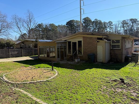 fenced backyard with ample parking