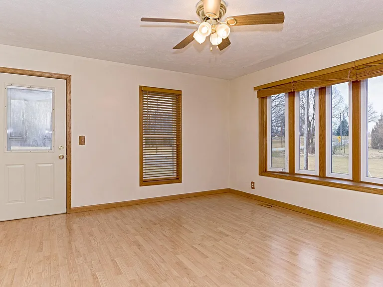 Dining area off eat-in kitchen.