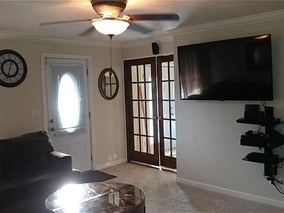 Spacious Living Room With French Doors To The Family Room