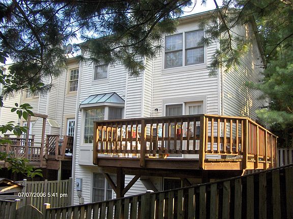 Backyard with deck, sunny
