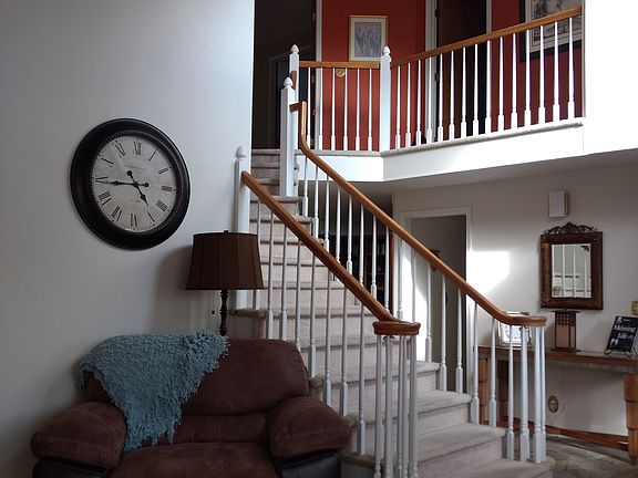 Front entry with staircase.