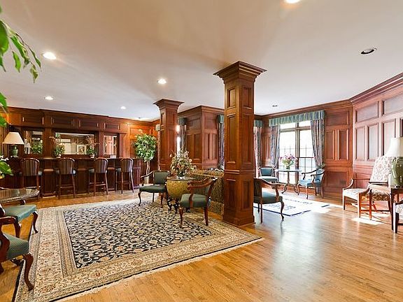 GORGEOUS PANELED CLUB ROOM IS AVAILABLE FOR THE USE OF ALL HOMEOWNERS