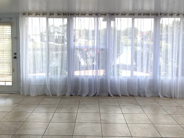 Enclosed lanai - spacious for entertaining and enjoying sea birds and water views