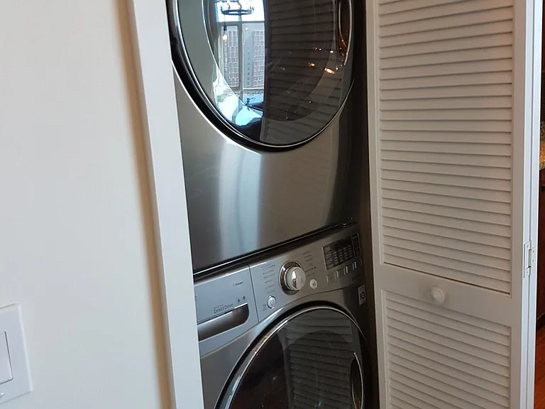 Stacked stainless washer and dryer