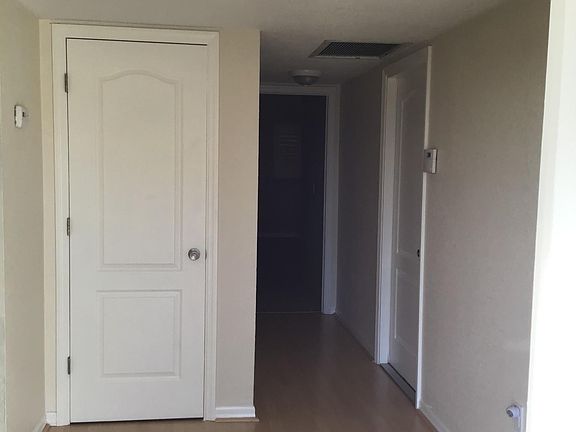 Front hall entry with storage closet