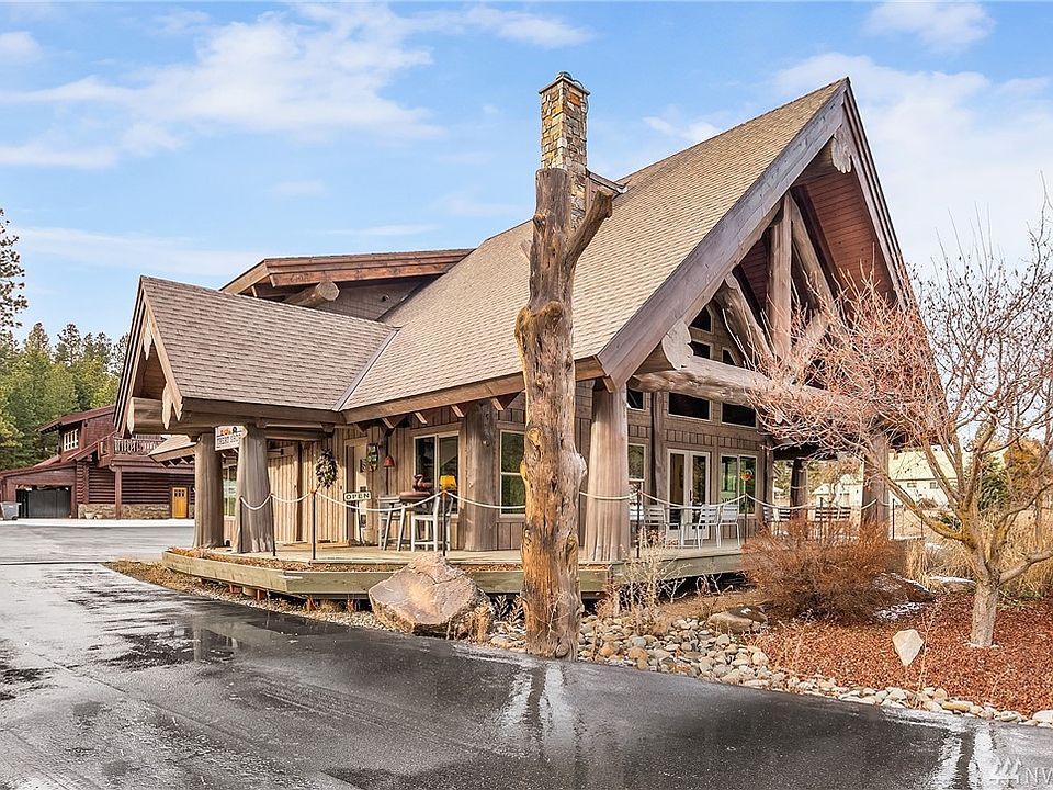 Two log homes on this amazing property. The home in the front was built in 2014, the one in back was built in 2004.