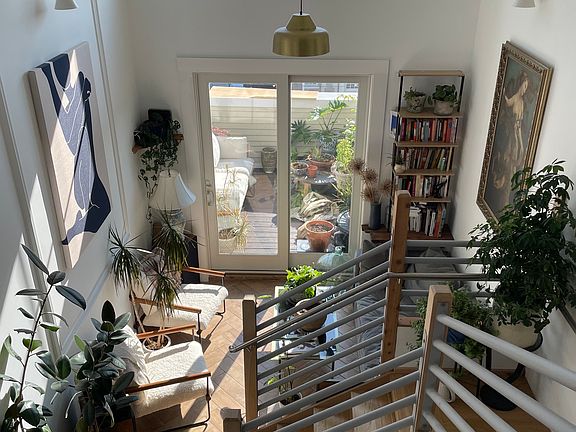 Looking into the main living space from the upstairs landing