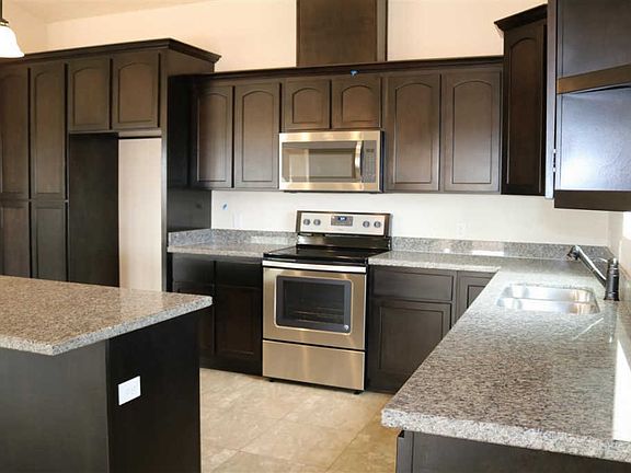 5th image of 8568 E 34th Pl