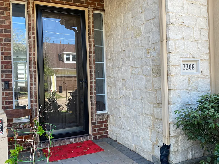 Front Entry with Glass Strom Door