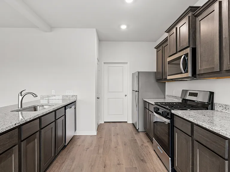The kitchen of the Cypress has energy-efficient appliances.