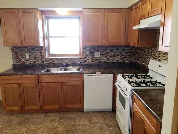 Kitchen with new tiled backsplash
