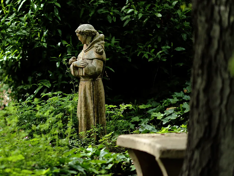 Devotional statues can be found around the grounds, offering a quiet spot for reading or contemplation.