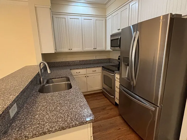 219 Oyster Point Dr — Photo 3