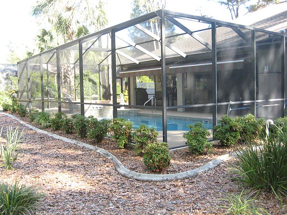 back yard to pool lanai