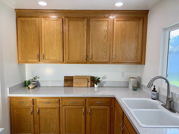 Oak Cabinets and Quartz Countertops