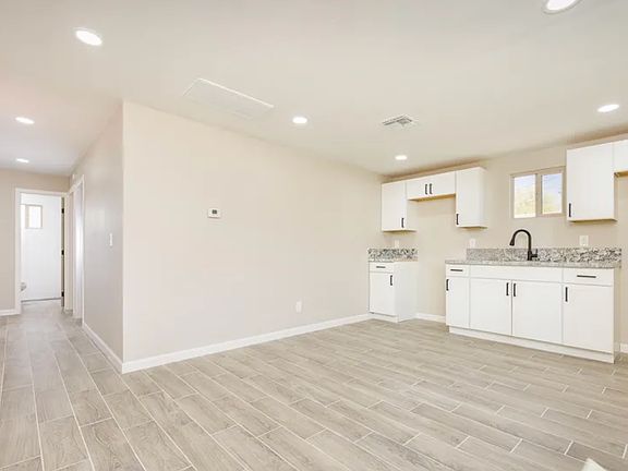 Open Concept Kitchen. (Range top/Oven and Refrigerator included)