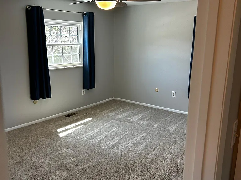 master bedroom with new ceiling fan.