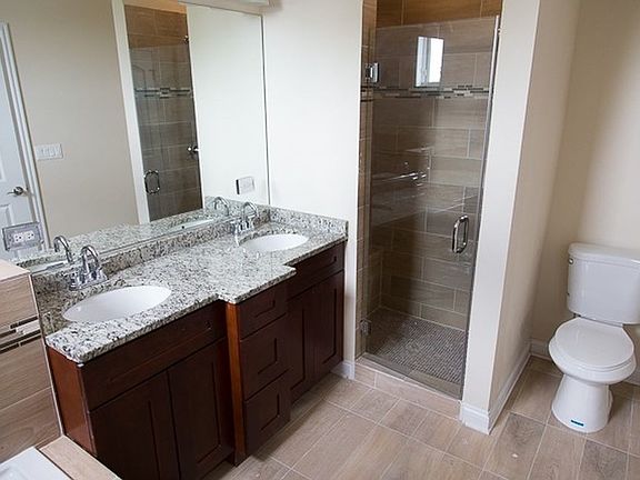 Double sinks in master bath + jacuzzi tub