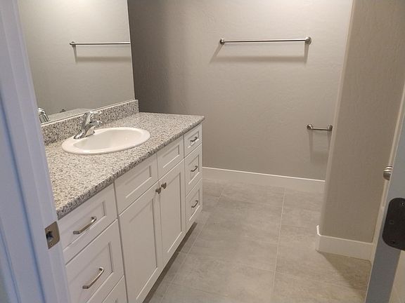 Master bathroom with walk-in closet
