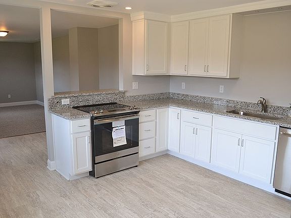 Kitchen with bonus room