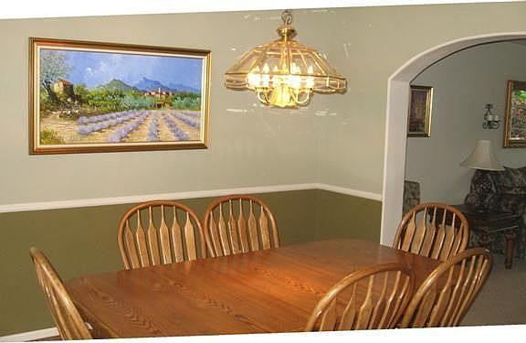The formal dining room has hardwood floors