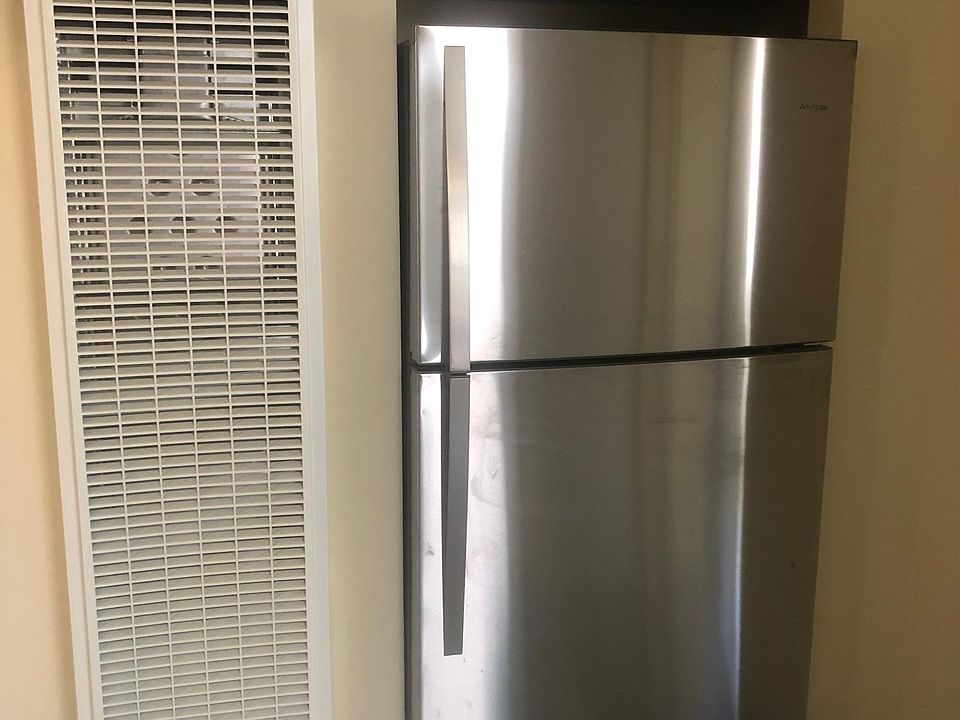 Large refrigerator. Wall heater.