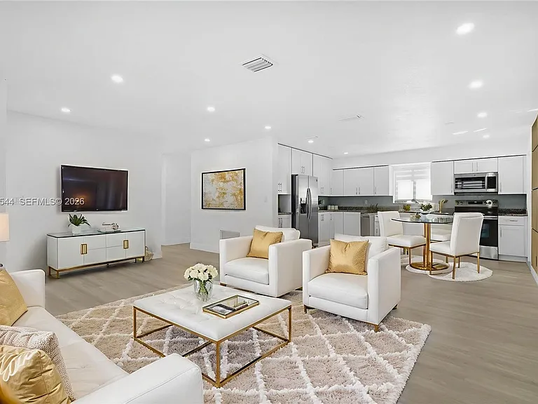 7501 Raleigh St — Photo 3