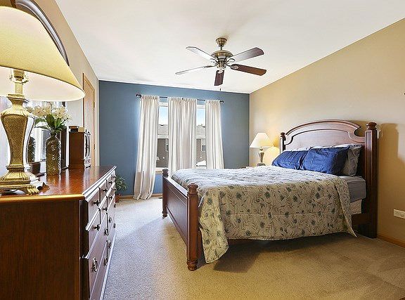 Spacious master bedroom has 2 walk in closets and attaches to shared hall bath