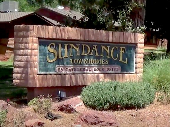 Entry into Sundance Townhomes of approx. 60 units. Beautiful maintained homes & grounds. Short walk to pool, golf, pickle ball, tennis courts, playground for kids.