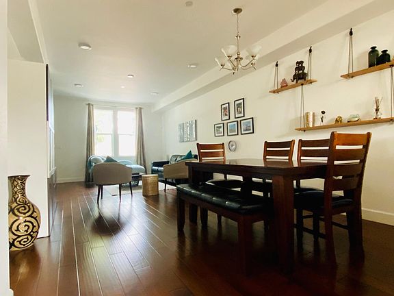 Open floor plan, high-end hardwood floors, perfect for entertaining!