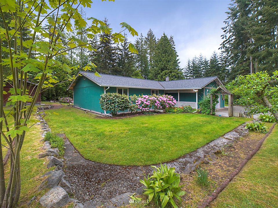 Lovely one story home on nearly 3 acres. 