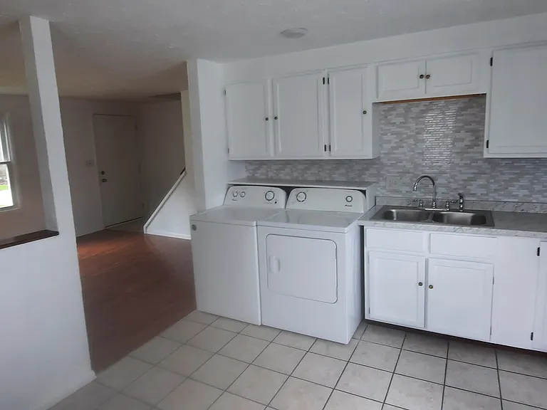 Kitchen view into living room