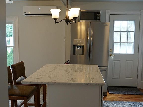 Kitchen island looking toward the entrance