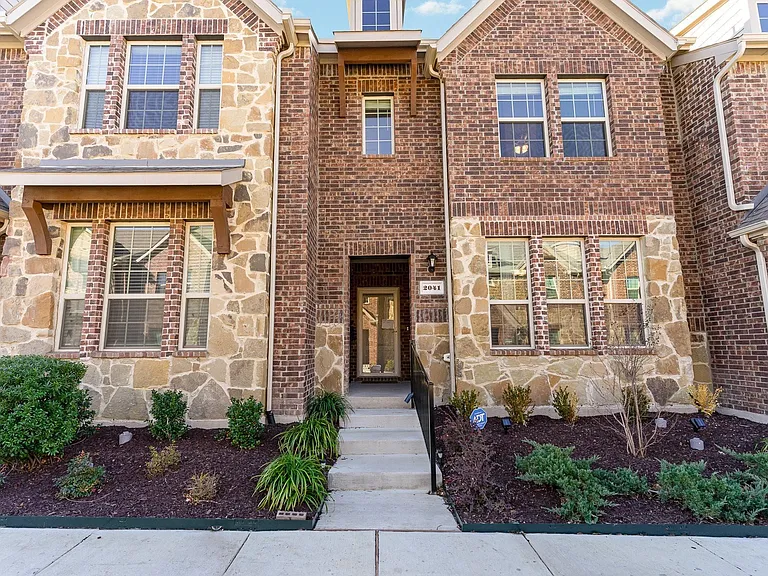Welcome to 2041 Juniper Pass Way on the right with brick over stone