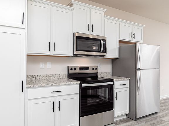 Each kitchen includes satinless steel appliances