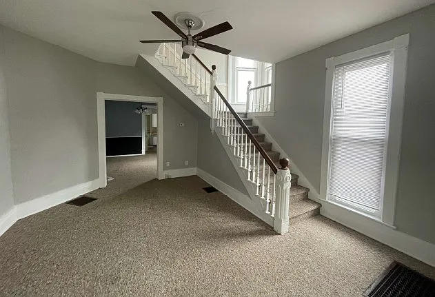 Open your front door and enter into the first spacious room