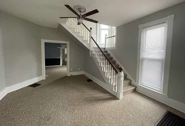 Open your front door and enter into the first spacious room