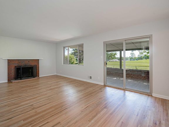 Newly refinished wood flooring and fresh paint