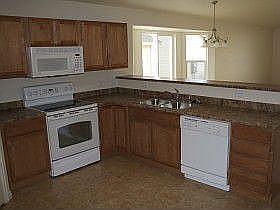 Clean kitchen and breakfast bar