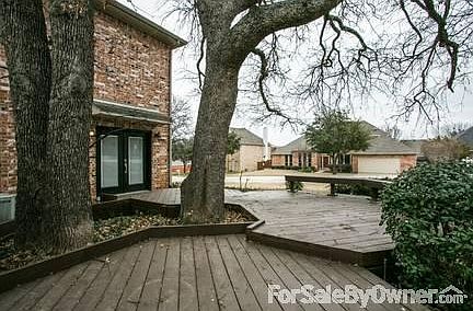 Deck off front, side yard
						:
						Newly rebuilt and stained deck. French doors enter into the dining room.