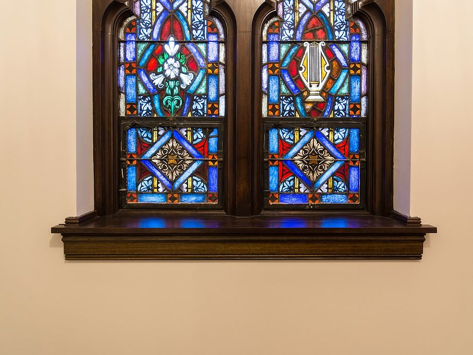 Art glass window in bedroom