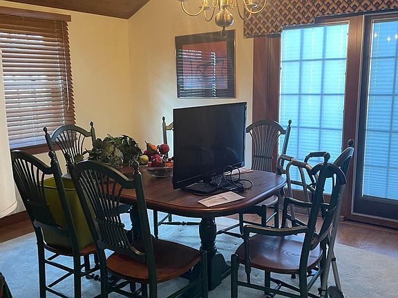 Large great room off kitchen w dinning area and large tv area w gas fireplace insertinsert