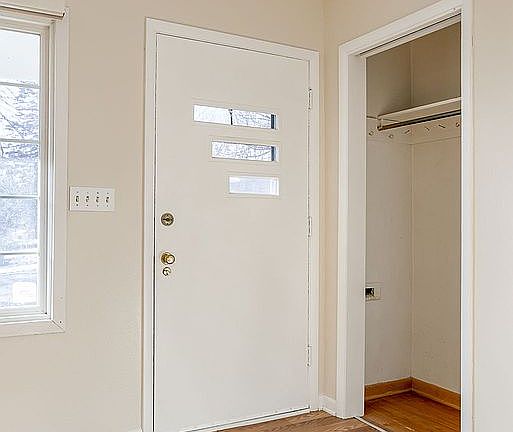 Front Door and Coat Closet