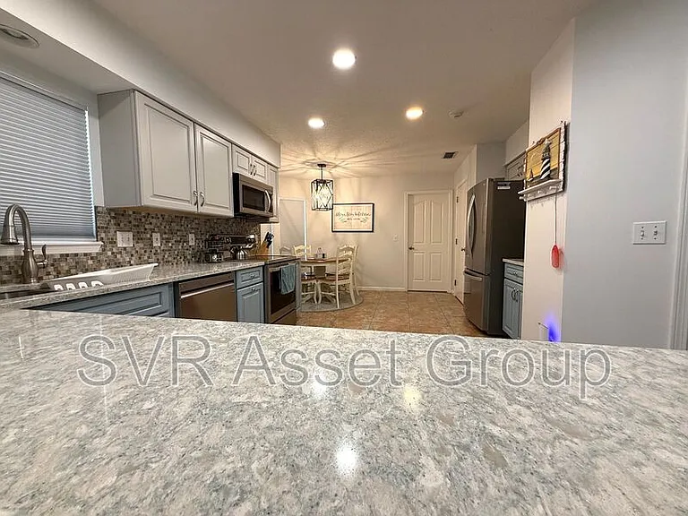 8997 Adams Walk Dr — Photo 18